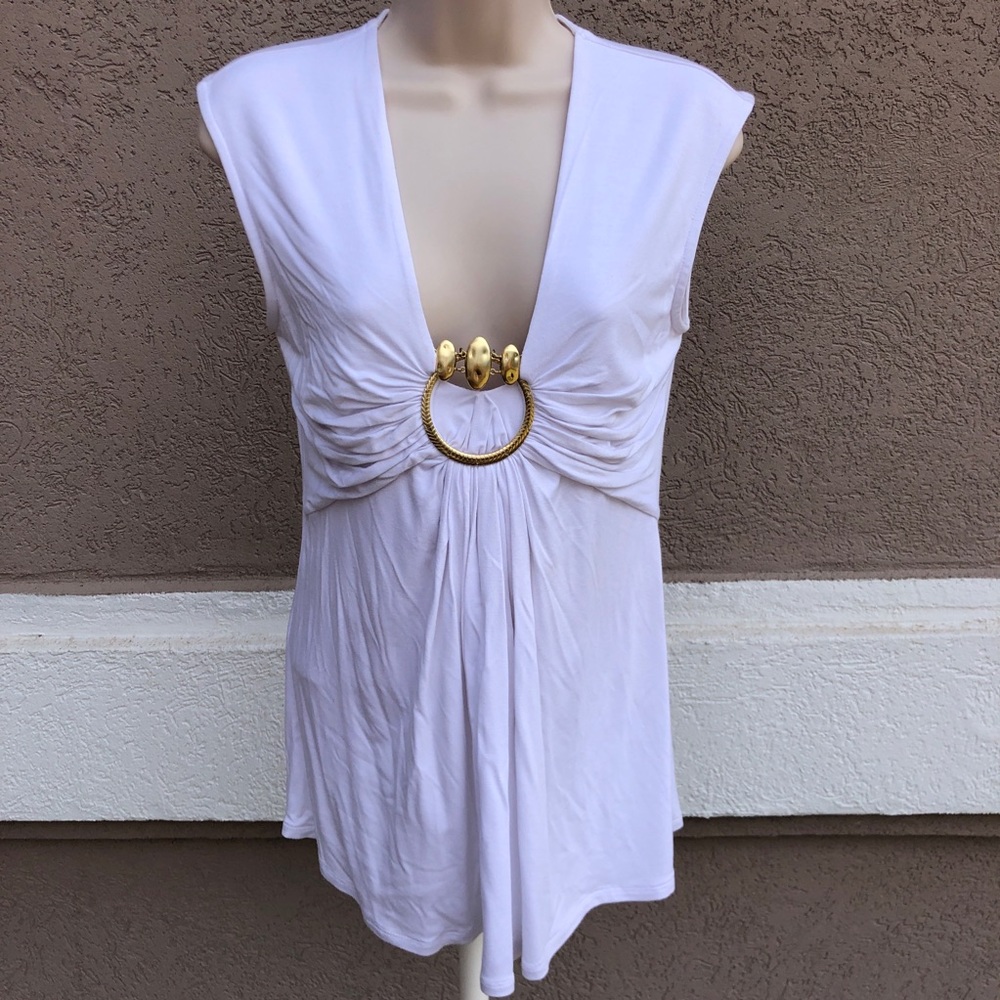 White top with gold. size Small from Caché